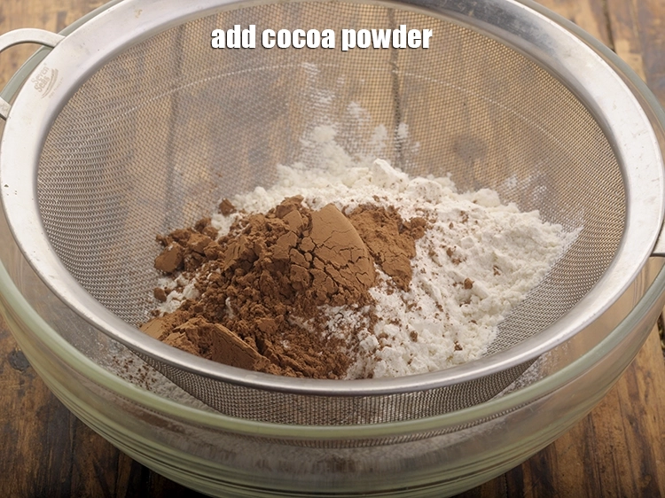 Step 4 – <p>Add 2 tbsp <a href="https://www.tarladalal.com/glossary-cocoa-powder-284i"><u>cocoa powder</u></a><u>.</u></p>