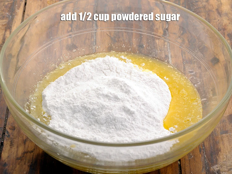 Step 6 – <p style="margin-left:0px;">Add 1/2 cup <a href="https://www.tarladalal.com/glossary-powdered-sugar-280i"><u>powdered sugar</u></a>.</p>