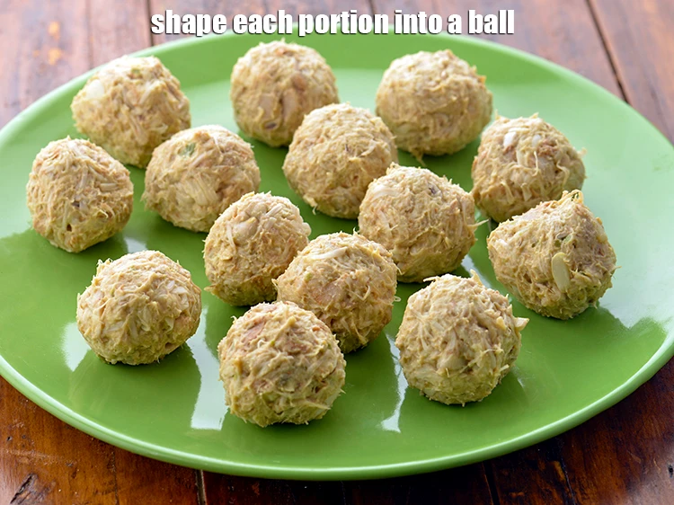 Step 8 – <p>Divide the <strong>dough</strong> into 14 equal portions and shape each portion into a <strong>ball</strong>.</p>