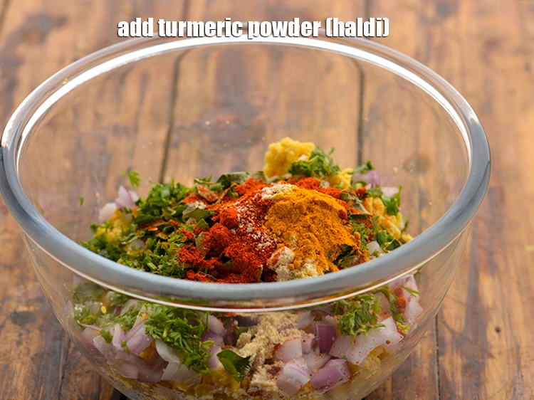 Step 17 – <p>Add 1/4 tsp <a href="https://www.tarladalal.com/glossary-turmeric-powder-haldi-645i"><u>turmeric powder (haldi)</u></a>.</p>
