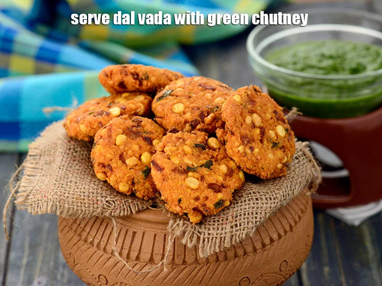 Step 26 – <p>Serve the <strong>dal vada</strong> immediately with <a href="https://www.tarladalal.com/green-chutney-how-to-make-green-chutney-recipe-22266r">green chutney</a>.</p>