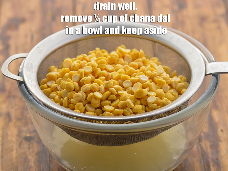 Step 7 – <p><strong>Drain </strong>well and remove ¼ cup of soaked and drained <strong>chana dal</strong> in a bowl …