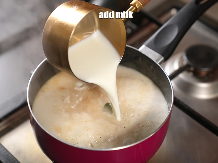 Step 11 – <p>Add 1 cup <a href="https://www.tarladalal.com/glossary-milk-doodh-full-cream-milk-514i"><u>milk</u></a><u>.</u></p>