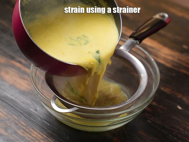 Step 15 – <p><span style="background-color:rgb(255,255,255);color:rgb(0,0,0);">Remove from the flame and <strong>strain</strong> using a strainer.</span></p>