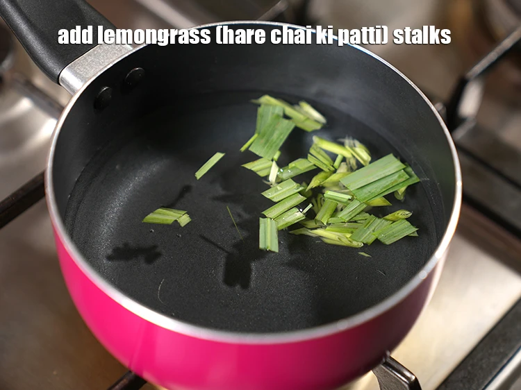 Step 3 – <p>Add 2 to 3 <a href="https://www.tarladalal.com/glossary-lemongrass-lemon-grass-hare-chai-ki-patti-475i"><u>lemongrass (hare chai ki patti) </u></a>stalks , cut into 50 …