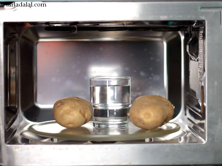 Step 23 – <p>Place a glass of water in the centre to prevent them from getting wrinkled. Microwave …