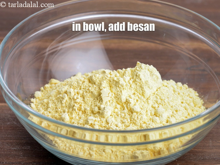 Step 14 – <p>To make the <strong>besan batter</strong>, <span style="background-color:rgb(255,255,255);color:rgb(0,0,0);">In a deep bowl, add </span>1/2 cup <a href="https://www.tarladalal.com/glossary-besan-chana-dal-flour-bengal-gram-flour-952i"><u>besan …