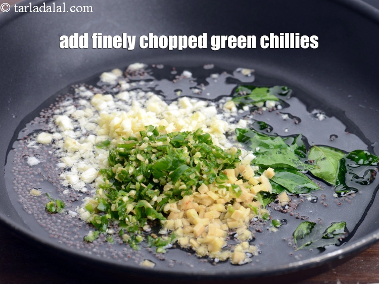 Step 35 – <p>Add the 1/2 tbsp finely <a href="https://www.tarladalal.com/glossary-green-chillies-hari-mirch-331i#ing_2388"><u>chopped green chillies</u></a><u>.</u></p>