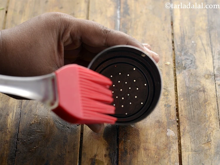 Step 38 – <p>This is a ‘sev press’, also called ‘chakli press’. Insert the mould with small hole. …