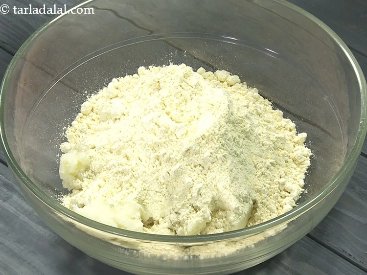 Step 27 – <p>Add 1 3/4 cups&nbsp;<a href="https://www.tarladalal.com/glossary-besan-chana-dal-flour-bengal-gram-flour-952i">besan (bengal gram flour)</a>.</p>