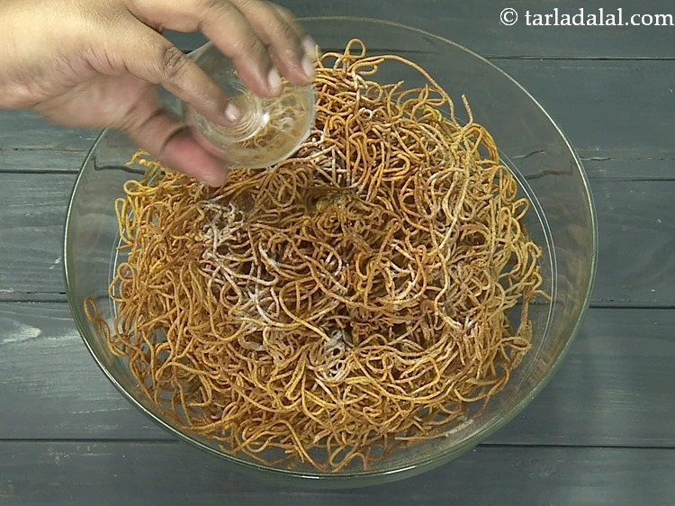 Step 50 – <p>Add 1 tsp&nbsp;<a href="https://www.tarladalal.com/glossary-chaat-masala-300i">chaat masala</a>&nbsp;evenly over it.</p>