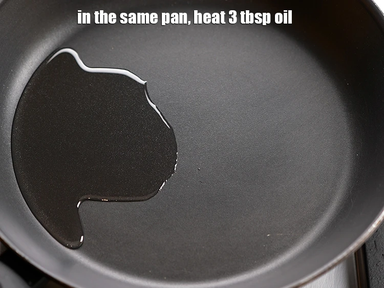 Step 3 – <p>For making the <strong>poha chivda recipe</strong>, in the same pan, heat 3 tbsp&nbsp;<a href="https://www.tarladalal.com/glossary-oil-671i">oil</a>.&nbsp;</p>