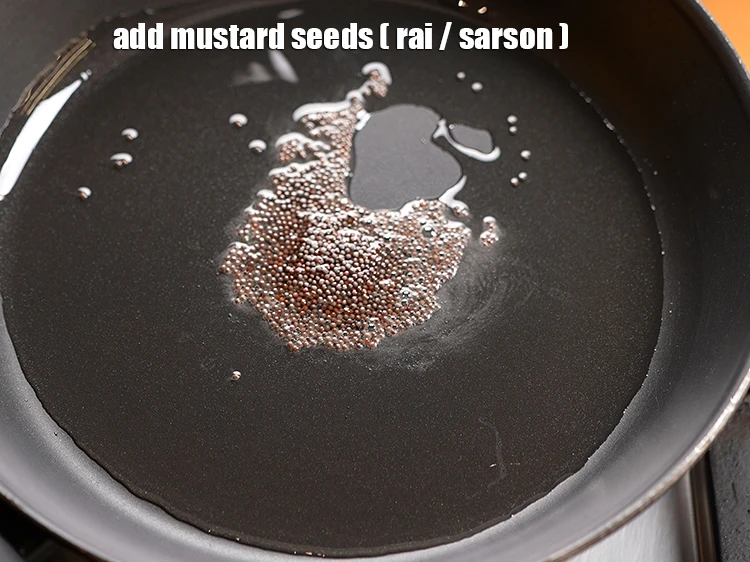Step 4 – <p>Once the oil is hot, add 1 tsp&nbsp;<a href="https://www.tarladalal.com/glossary-mustard-seeds-sarson-rai-sarson-ke-beej-525i">mustard seeds ( rai / sarson )</a>.</p>