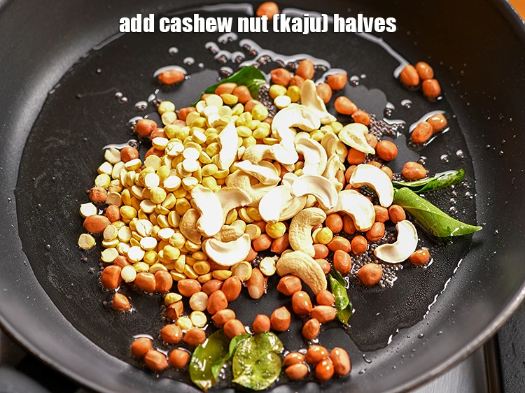 Step 8 – <p>Add 2 tbsp&nbsp;<a href="https://www.tarladalal.com/glossary-cashew-nut-halves-2511i">cashew nut (kaju) halves</a>. Also, you can toss in some coconut slices, …