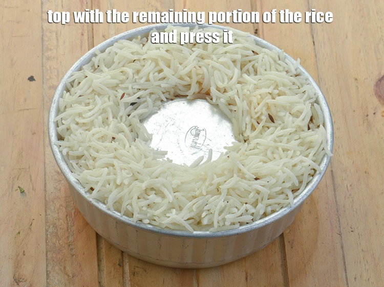 Step 11 – <p><span style="background-color:rgb(255,255,255);color:rgb(0,0,0);">Top with the remaining portion of the <strong>rice</strong> and press it lightly using a …