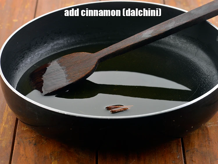 Step 2 – <p>Add 25 mm (1") piece <a href="https://www.tarladalal.com/glossary-cinnamon-dalchini-346i"><u>cinnamon (dalchini)</u></a><u>.</u></p>