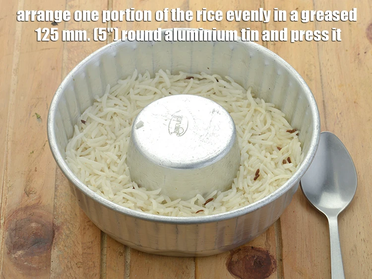 Step 9 – <p>To make the <strong>Bhaji Pulao, Layered Pav Bhaji Pulao</strong>, Divide the <strong>rice</strong> into 2 equal …