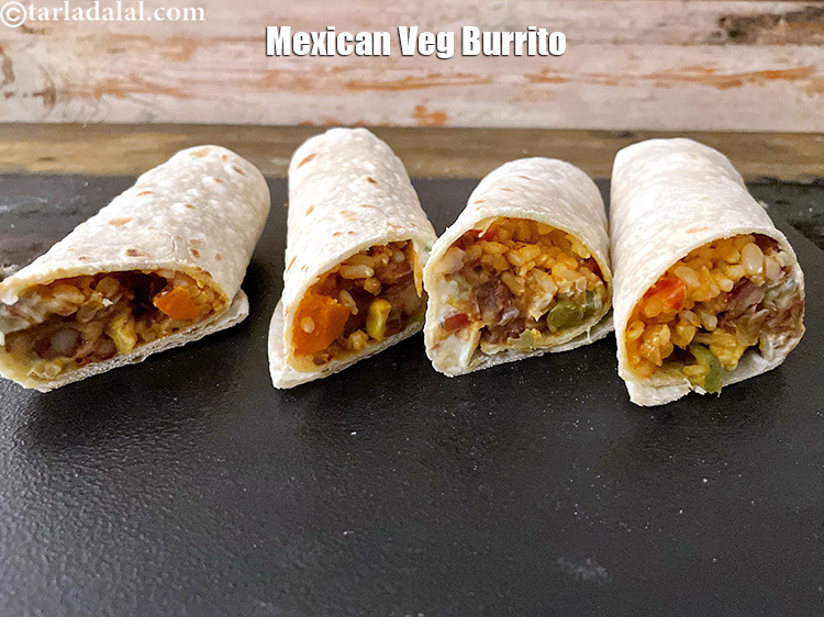 Step 129 – <p>Serve <strong>burritos recipe</strong><span style="background-color:rgb(255,255,255);color:rgb(0,0,0);"> | </span><strong>Mexican burritos</strong><span style="background-color:rgb(255,255,255);color:rgb(0,0,0);"> | </span><strong>vegetarian bean and rice burrito</strong><span style="background-color:rgb(255,255,255);color:rgb(0,0,0);"> …