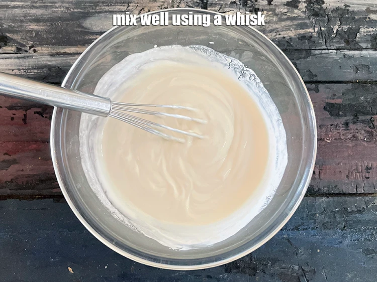 Step 12 – <p>Mix well using a whisk.</p>