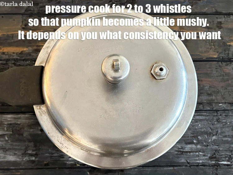 Step 18 – <p>Pressure cook for 2 to 3 whistles so that the pumpkin becomes a little mushy. …