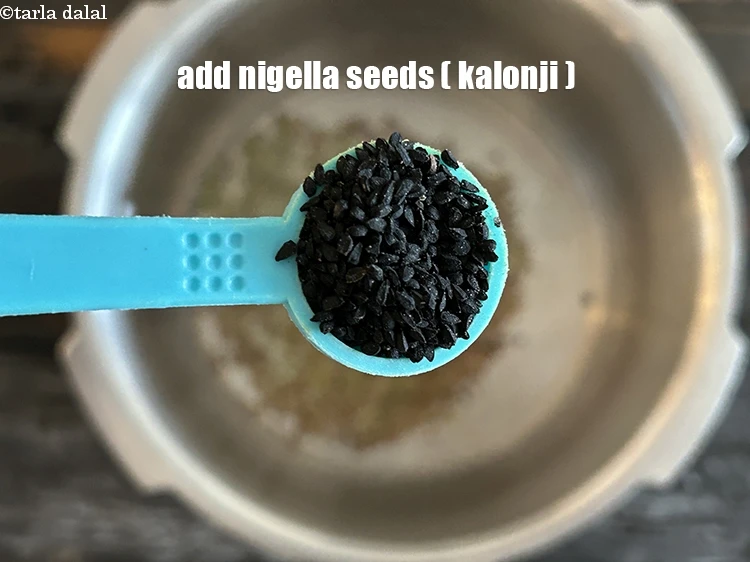 Step 7 – <html><head></head><body><p>Add&nbsp;1/2 tsp&nbsp;<a href="glossary-nigella-seeds-kalonji-onion-seeds-552i">nigella seeds (kalonji)</a>.</p></body></html>