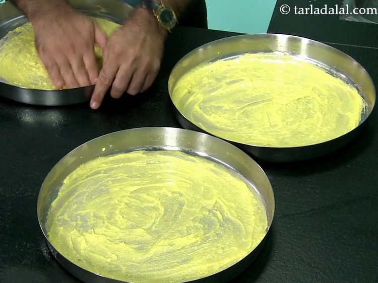 Step 20 – <p>Spread the mixture in a circular motion into a thin layer using a vati. Many …