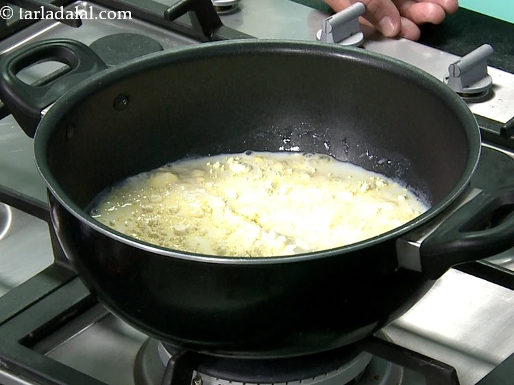 Step 8 – <p>Carefully, add curds-water mixture.</p>