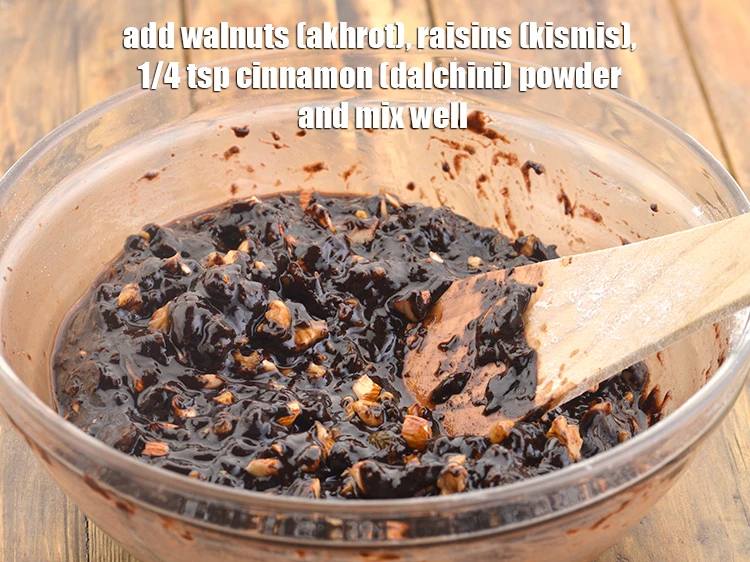 Step 11 – <p>1/2 cup <a href="https://www.tarladalal.com/glossary-walnuts-akhrot-784i#ing_3224"><u>chopped walnuts (akhrot)</u></a><u>, </u>1/2 cup <a href="https://www.tarladalal.com/glossary-raisins-kishmish-kismis-597i"><u>raisins (kismis)</u></a><u>, </u>1/4 tsp <a href="https://www.tarladalal.com/glossary-cinnamon-dalchini-346i#ing_3336"><u>cinnamon …