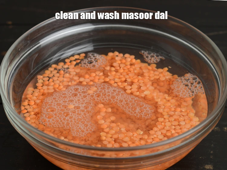Step 4 – <p>Clean and wash masoor dal. Use your fingers to remove dirt from the dal. You …