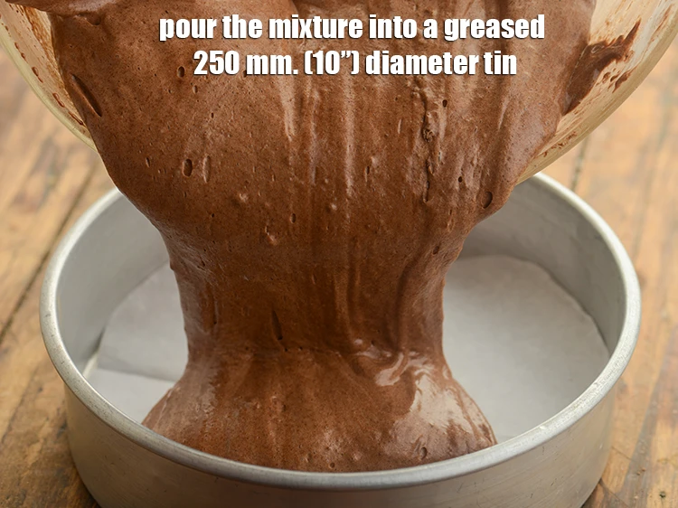 Step 10 – <p>Pour the mixture into a greased 250 mm. (10”) diameter tin.</p>