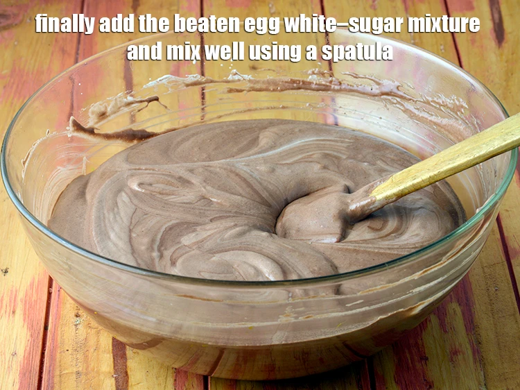 Step 8 – <p><span style="background-color:rgb(255,255,255);color:rgb(0,0,0);">Finally add the <strong>beaten egg white–sugar mixture</strong> and mix well using a spatula.</span></p>