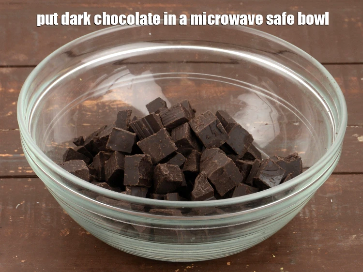 Step 2 – <p><span style="background-color:rgb(255,255,255);color:rgb(0,0,0);">Put the </span>3/4 cup chopped <a href="https://www.tarladalal.com/glossary-dark-chocolate-plain-chocolate-324i"><u>dark chocolate</u></a><span style="background-color:rgb(255,255,255);color:rgb(0,0,0);"> in a <strong>microwave</strong> safe bowl.</span></p>