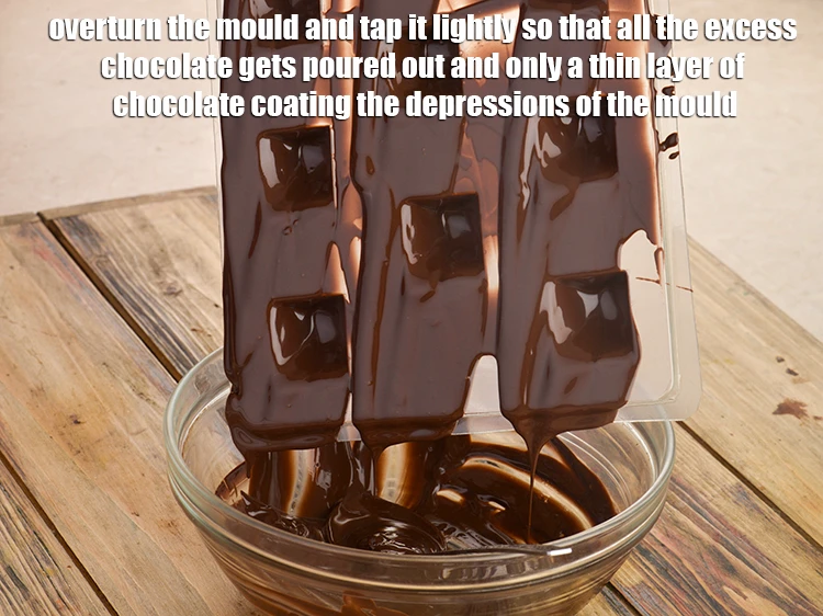 Step 5 – <p><span style="background-color:rgb(255,255,255);color:rgb(0,0,0);">Overturn the mould and tap it lightly so that all the excess chocolate gets …
