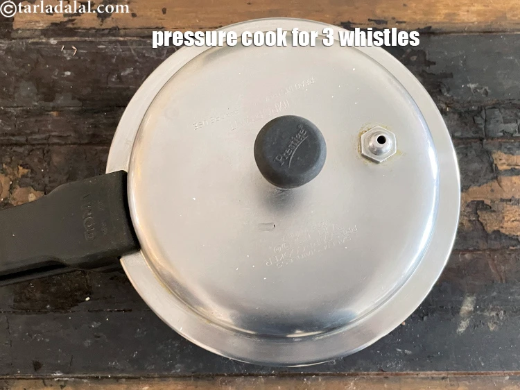 Step 21 – <p>Pressure cook for 3 whistles.</p>