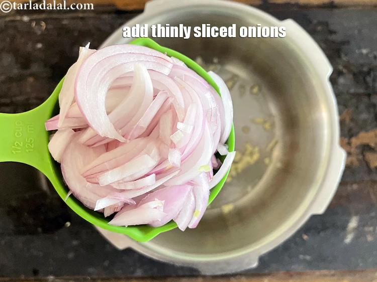 Step 11 – <html><head></head><body><p>Add&nbsp;1/2 cup&nbsp;thinly&nbsp;<a href="glossary-sliced-onions-745i">sliced onions</a>.</p></body></html>