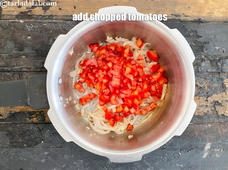 Step 13 – <html><head></head><body><p>Add&nbsp;3/4 cup&nbsp;<a href="glossary-chopped-tomatoes-779i">chopped tomatoes</a>.</p></body></html>