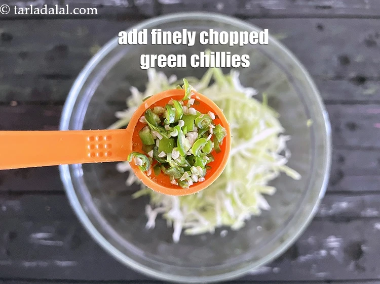 Step 13 – <p>Add 1 tsp finely <a href="https://www.tarladalal.com/glossary-green-chillies-hari-mirch-331i#ing_2388"><u>chopped green chillies</u></a>. Try and chop them very finely so …