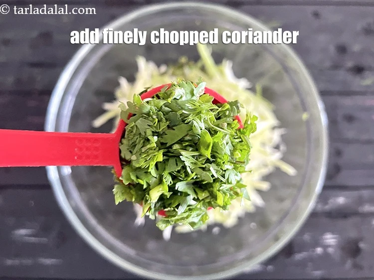 Step 14 – <p>Add 2 tbsp finely <a href="https://www.tarladalal.com/glossary-coriander-dhania-kothmir-369i#ing_2365"><u>chopped coriander (dhania)</u></a>. This fresh herb complements very well as&nbsp;<strong>Cabbage …
