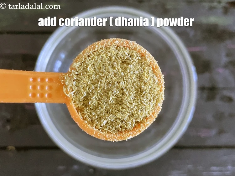 Step 6 – <p>Add 3/4&nbsp;tsp&nbsp;<a href="glossary-coriander-powder-dhania-powder-370i">coriander (dhania) powder</a>. This gives a true Indian touch to the dressing.</p>