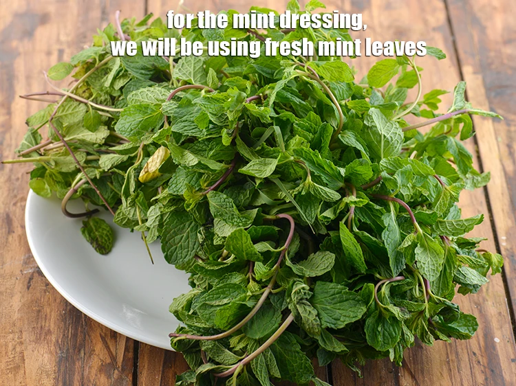 Step 29 – <p>For the mint dressing, we will be using <strong>fresh mint leaves</strong>. Pick and clean the …