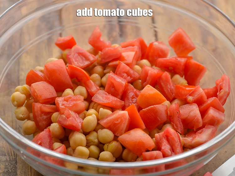 Step 18 – <p>Add 3/4 cup <a href="https://www.tarladalal.com/glossary-tomatoes-tamatar-639i#ing_2331"><u>tomato cubes</u></a>. Mint, coriander and tomato increase the folic acid and …