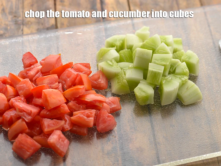 Step 10 – <p>Chop the <strong>tomato</strong> and <strong>cucumber</strong> into cubes.</p>
