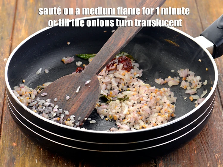 Step 14 – <p><strong>Sauté</strong> on a medium flame for 1 minute or till the onions turn translucent.</p>