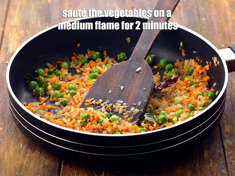 Step 17 – <p><strong>Sauté </strong>the vegetables on a medium flame for 2 minutes.</p>