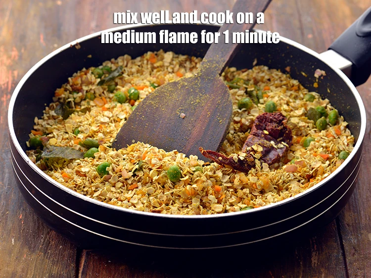 Step 21 – <p>Mix well and cook on a medium flame for 1 minute, while stirring continuously.</p>