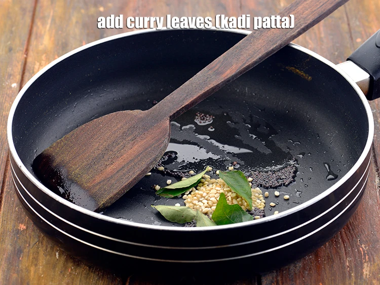 Step 10 – <p>Also, add 5 to 6 <a href="https://www.tarladalal.com/glossary-curry-leaves-kadi-patta-kadipatta-388i"><u>curry leaves (kadi patta)</u></a>.</p>