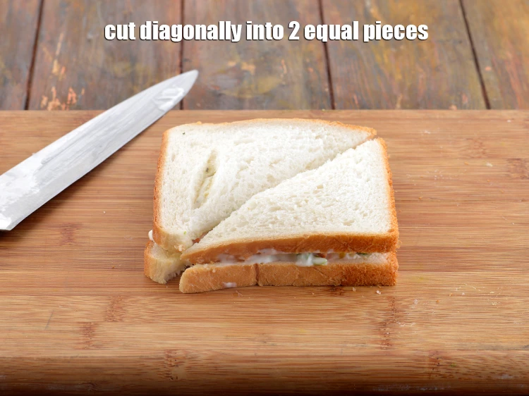 Step 16 – <p>Cut the&nbsp;<strong>Russian salad sandwich | veg Russian salad sandwich | Indian style&nbsp;cold&nbsp;Russian salad sandwich |</strong>&nbsp;diagonally …