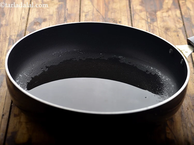 Step 2 – <p>For making the stuffing for <strong>Veg Spring Roll</strong>, heat the 1 tbsp <a href="https://www.tarladalal.com/glossary-oil-671i"><u>oil</u></a> in …