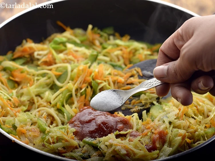 Step 14 – <p>Add the <a href="https://www.tarladalal.com/glossary-salt-namak-table-salt-418i"><u>salt </u></a>to taste. The sauces and boiled noodles consists of salt so, …