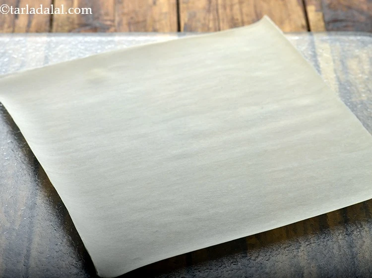 Step 18 – <p>For making<strong> Spring Roll </strong>recipe at home, place the <a href="https://www.tarladalal.com/glossary-rice-wrappers-1371i"><u>rice wrappers</u></a> on a clean,dry …